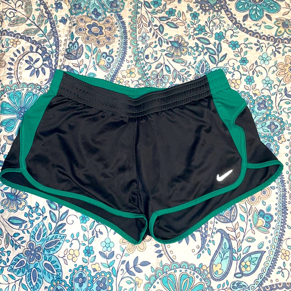 Gray and blue Nike running shorts